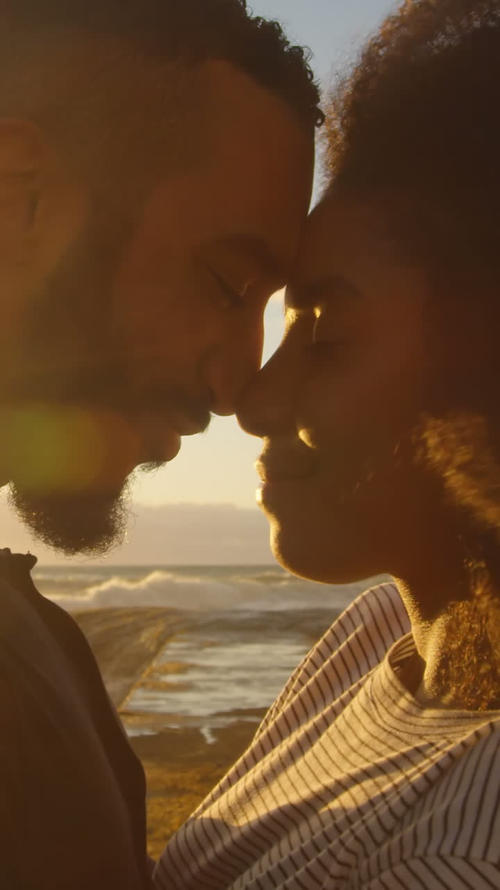 Couple embracing each other on the beach 4k