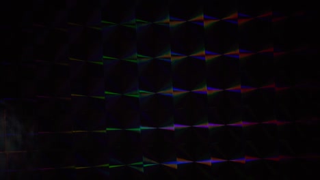 real shiny led light moving over silver rainbow holo foil