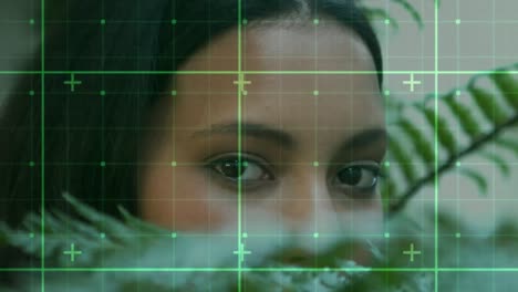 composición digital de la red de rejilla contra el acercamiento de los ojos de una mujer
