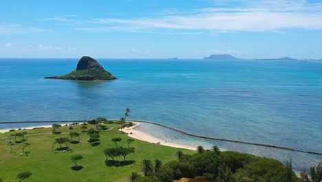 aerial view of kualoa regional park overlooking chinaman's hat on oahu