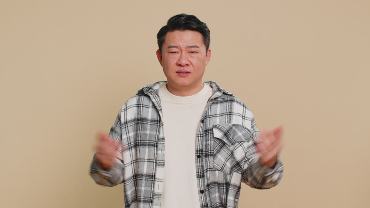 Angry asian man asking why what reason of failure irritation disbelief by troubles conflict quarrel