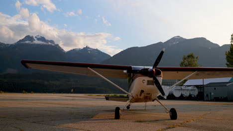 Aircraft-parked-near-hangar-4k