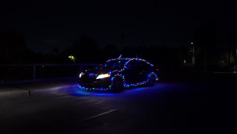 coche con desfile navideño de luces navideñas