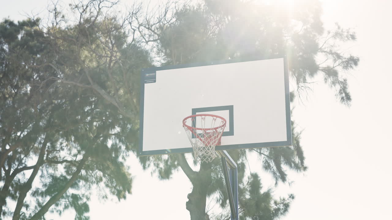 Basketball game with friends on outdoor court