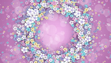 floral round frame on pink spring background. small flying flowers with abstract particles. looped holiday animation.