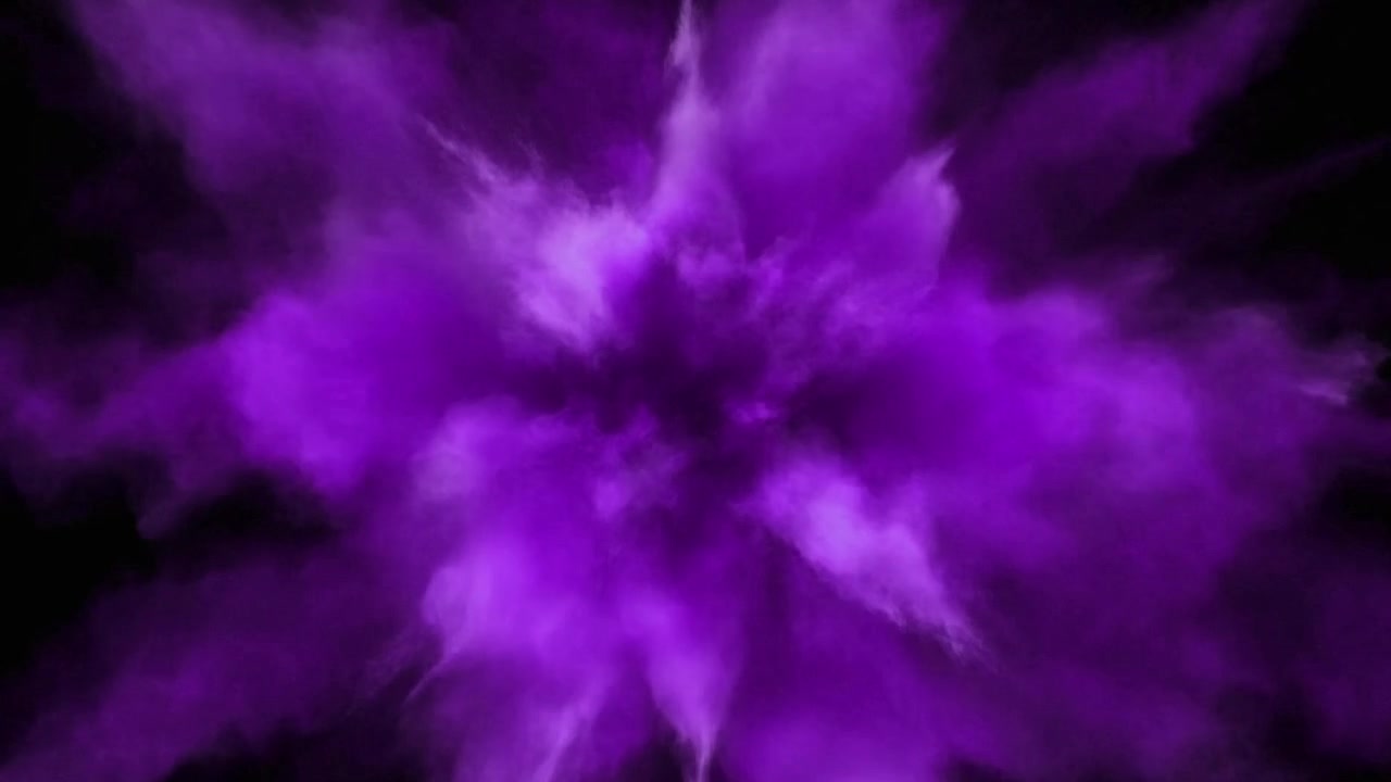 Lilla pulvereksplosion mod sort baggrund