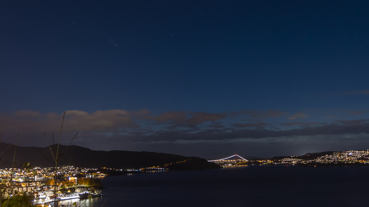The comet C2023 A3 (Tsuchinshan-ATLAS) visible in the sky over Bergen, Norway
