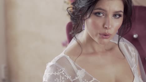 slow-motion-closeup-brunette-bride-with-brilliant-earrings