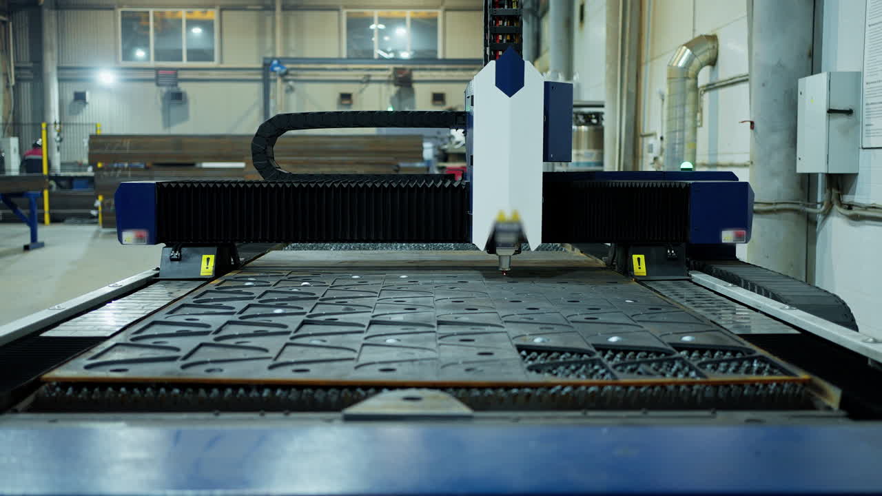 Laser Cutting Metal Sheets in a Factory