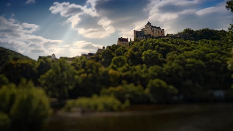 time-lapse tilt shift sunrise of castelnaud castel, evening background