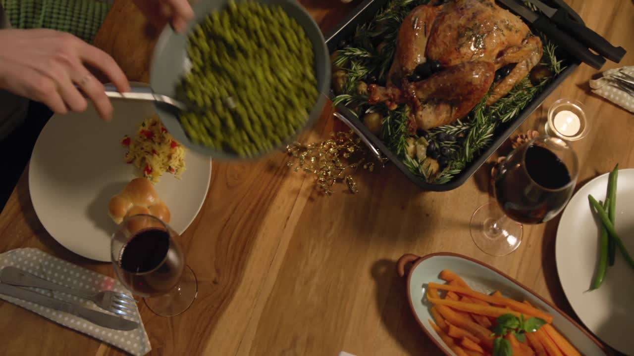 Millennial adult friends celebrating Thanksgiving together at home