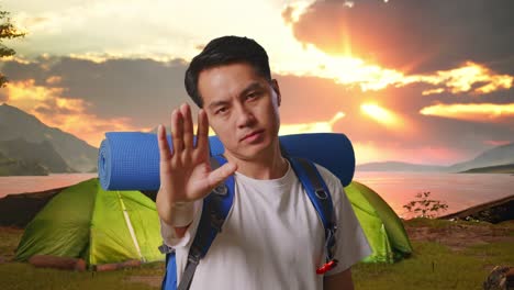 man refusing camping trip at sunset