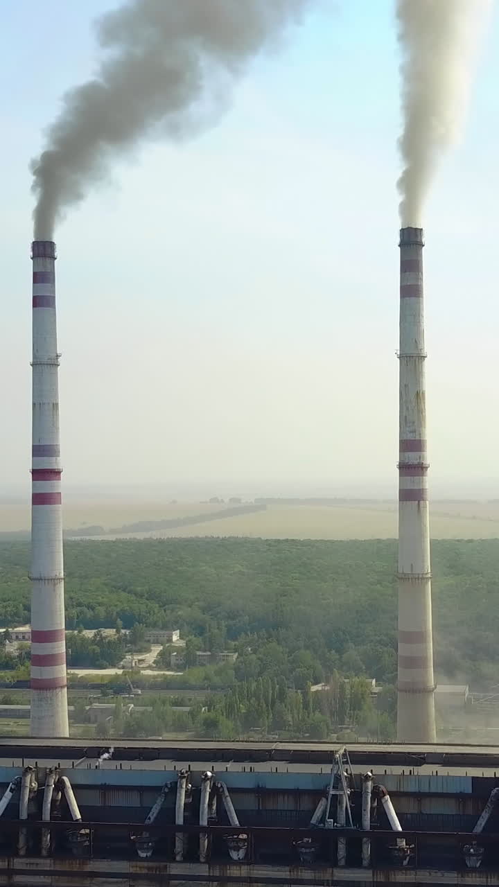 Smoking Pipes Of Thermal Power Plant. Smoke from factory chimney in an industrial plant