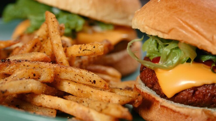 Slow Pan of Meat Free Cheese Burger with Salt and Pepper Chips