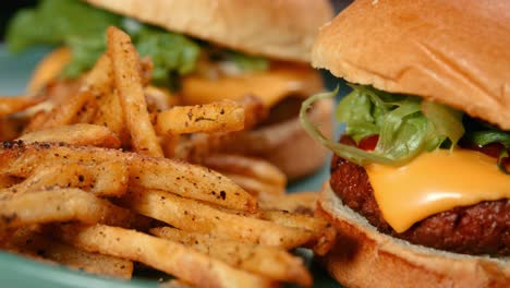 Slow-Pan-of-Meat-Free-Cheese-Burger-with-Salt-and-Pepper-Chips