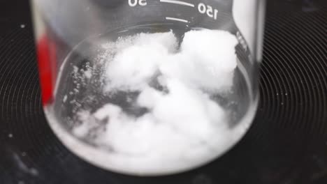 sodium acetate crystallizing in a beaker over time