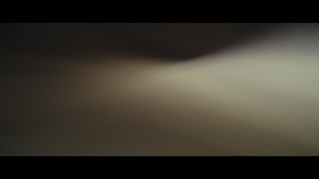 Real light leaks created by whacking an anamorphic lens