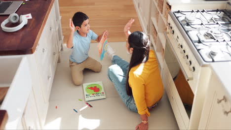 learning, high five and mother with child drawing