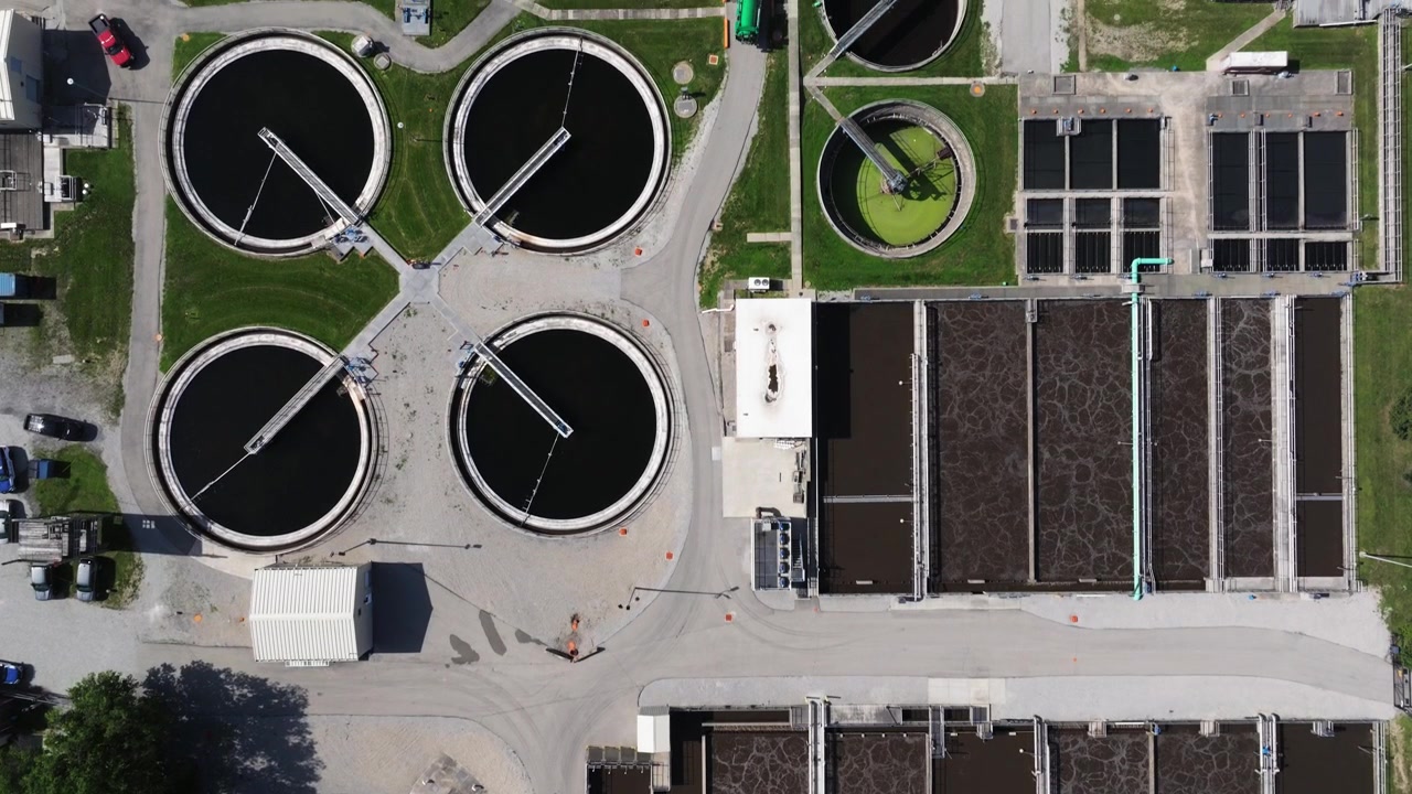 Birds Eye Drone View Above Entire Suburban Water Treatment Facility