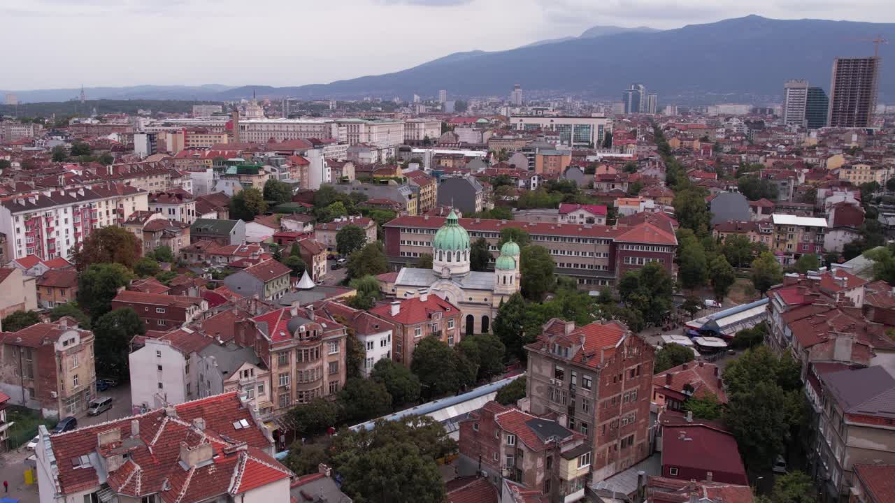Downtown Sofia Bulgaria. Establishing Drone Shot of Buildings and Orthodox Church
