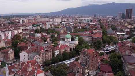 downtown sofia bulgaria. establishing drone shot of buildings and orthodox church