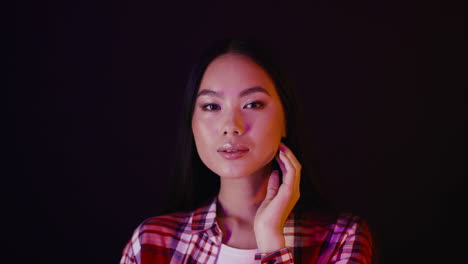 portrait of a woman in neon lighting