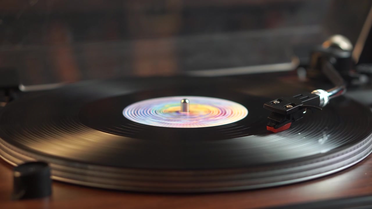 Spinning Long Play Vinyl Record on Turntable in Room Ambience