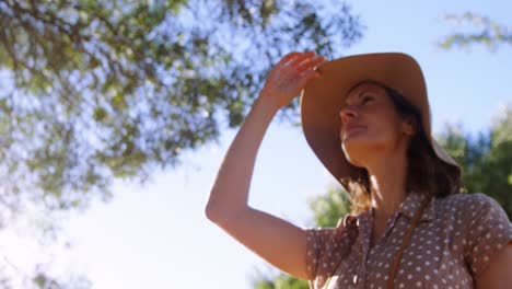 senior woman standing in resort 4k