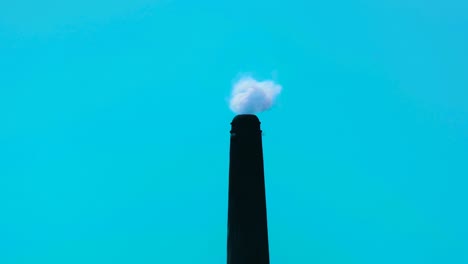 smoke hot steam from tube chimney of power plant - air pollution concept