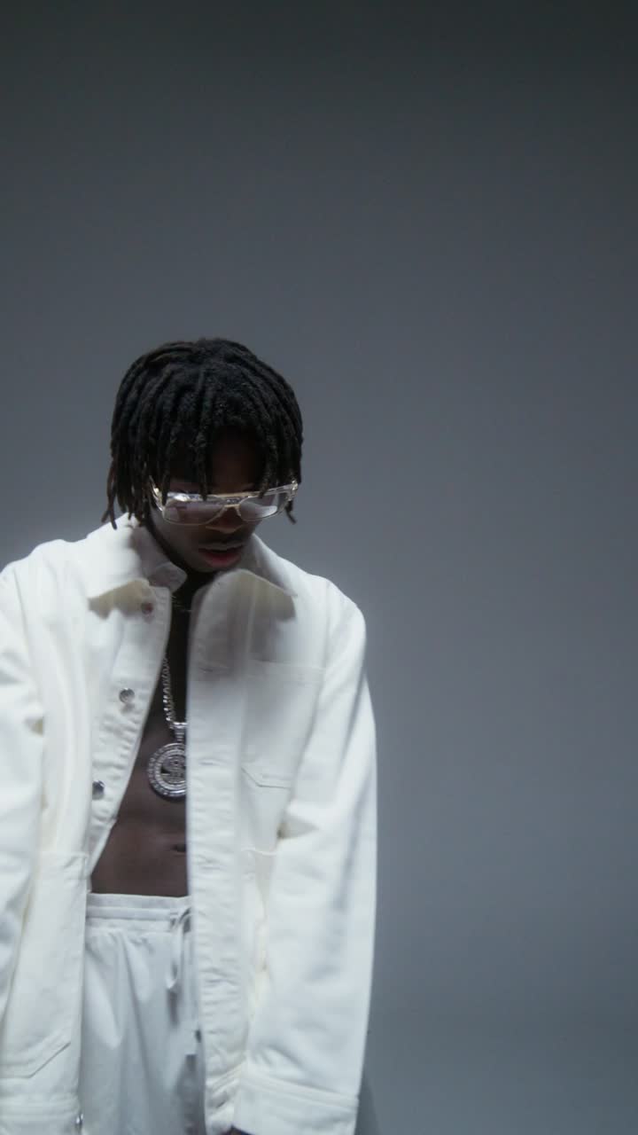 Man in White Fashion Jacket and Pants