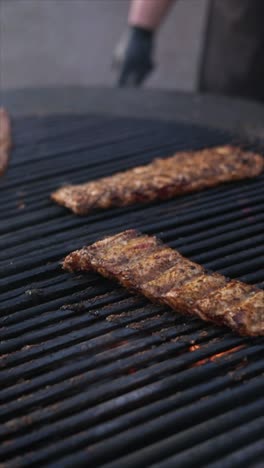 cooking ribs on a grill