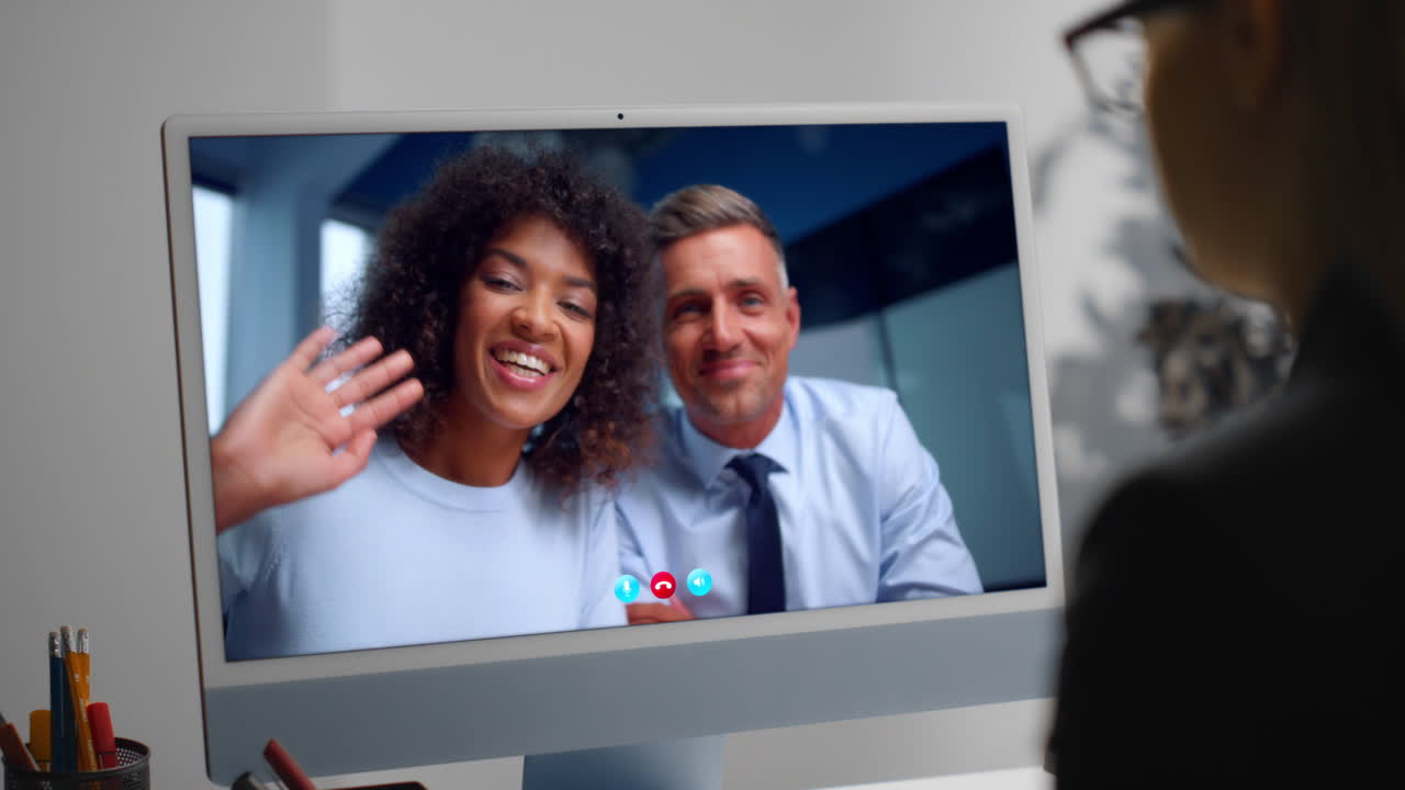 Office colleagues have virtual meeting by computer close up. Woman video calling