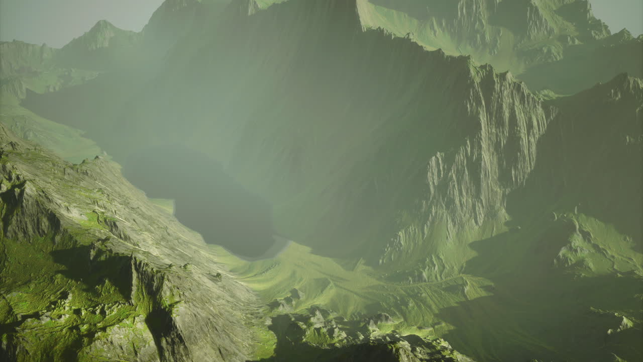 Mountain landscape with lush greenery and misty atmosphere during daytime