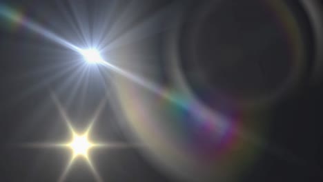 animation of white light with beam and prismatic lens flare on dark background