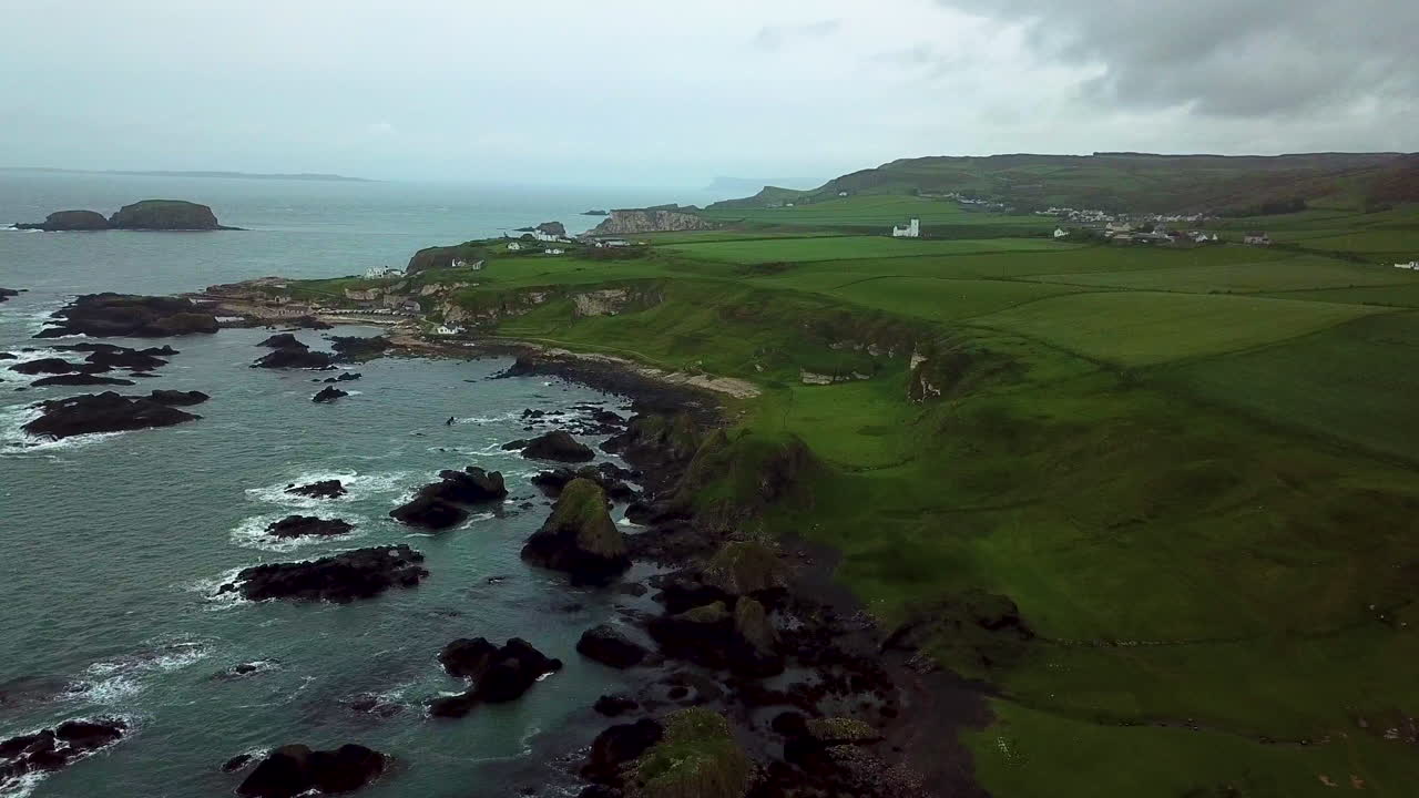 Cinematic aerial view of rocky coastline in northern Ireland