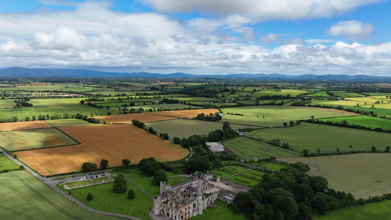 drone timelapse Carlow Ireland fertile farmlands and castle in summer