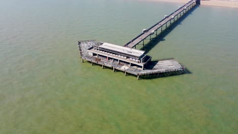 aerial parallax view of end of deal pier in kent