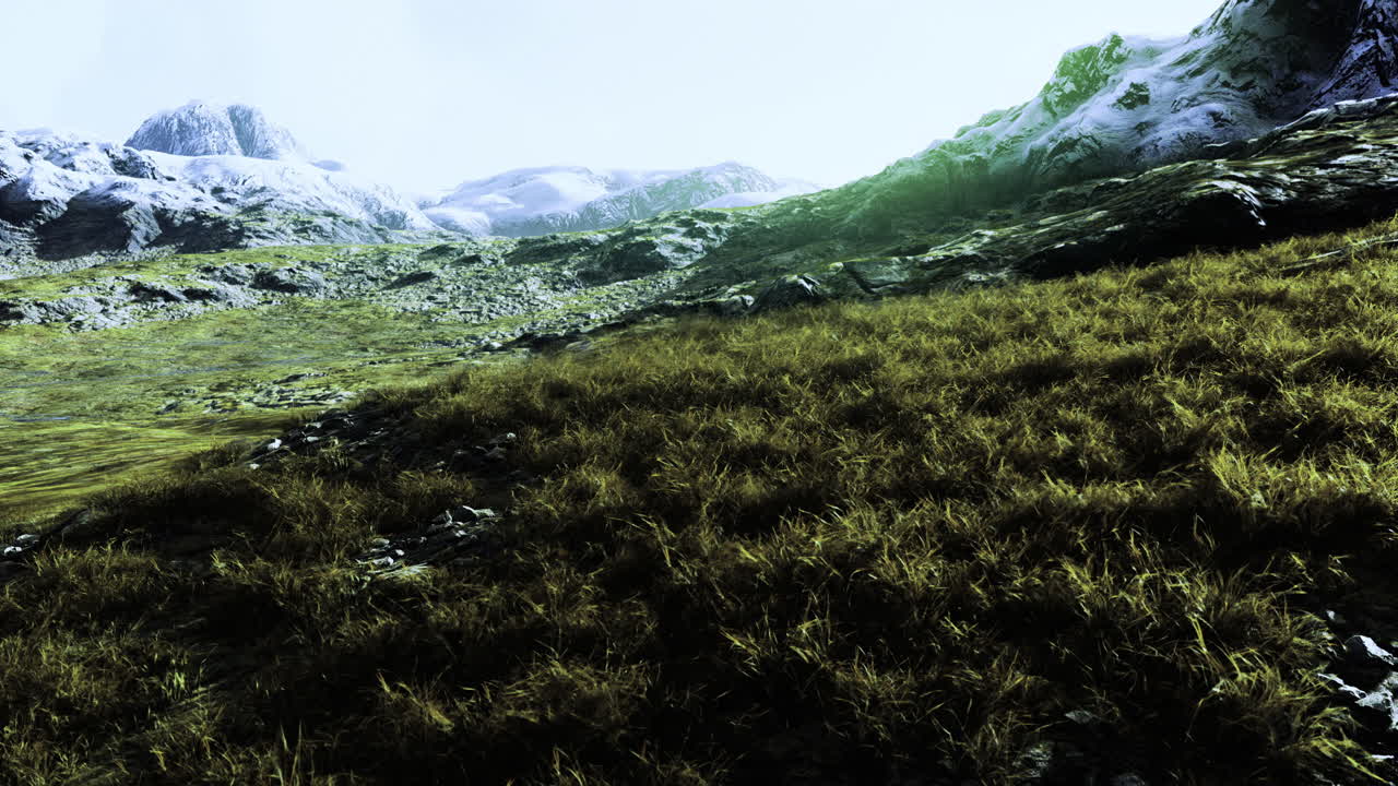 Expansive green meadow surrounded by majestic mountains under bright sky