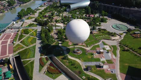 aerial: tbilisi rike park and air balloon tourist attraction in georgia