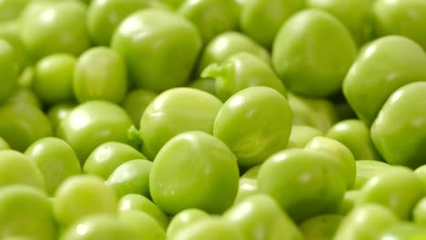 fresh green peas rotating close up top view fresh green peas rotating close up top view