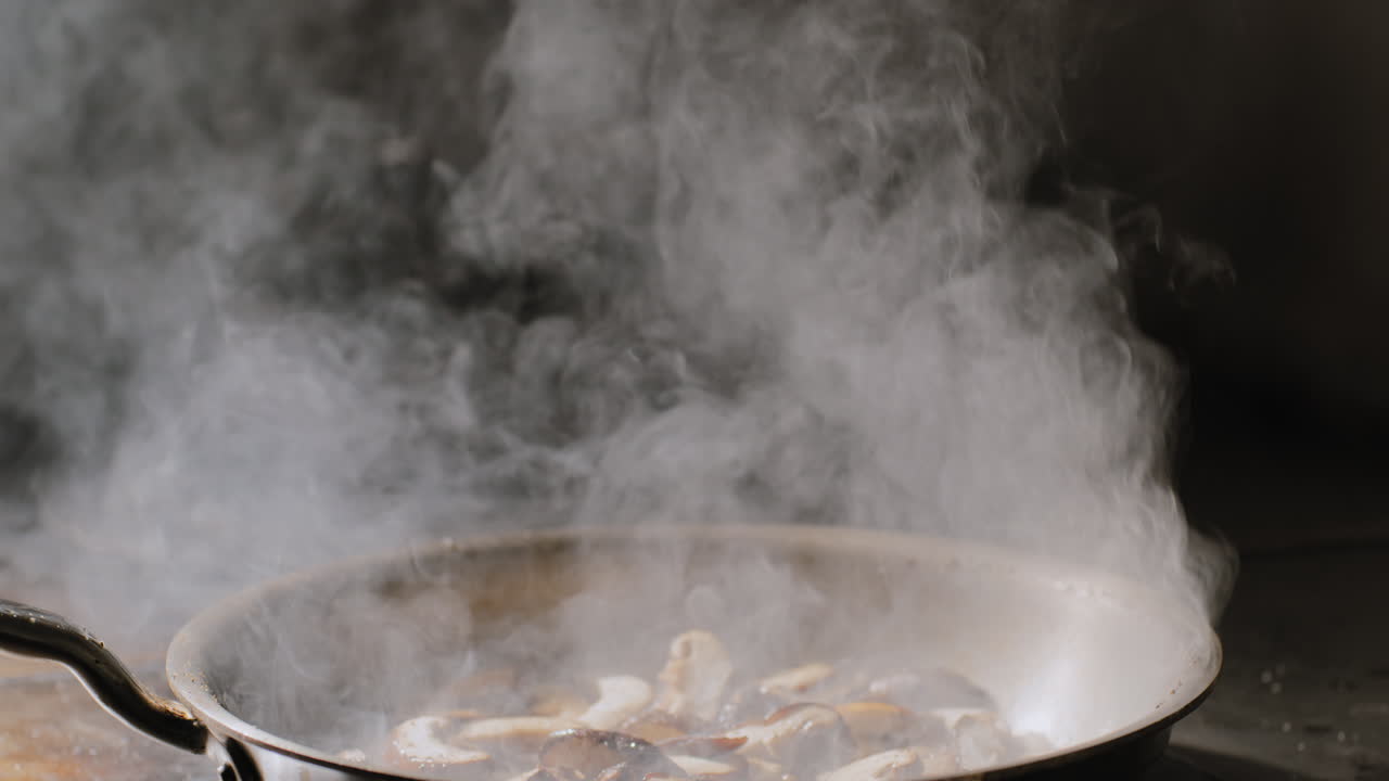 Mushrooms Being Saut&eacute;ed in a Hot Pan