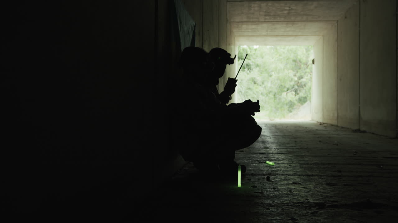 Silhouette of Drone Pilot Military Hidden in Bomb Bunker in Ukraine
