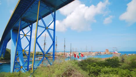 Zooming-out-shot-of-Tall-Ship-Regatta-Moored-along-the-coast-with-various-Latin-American-vessels