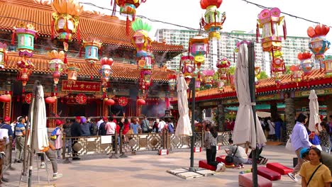 colorful lanterns and visitors at the temple