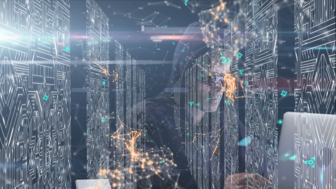 Animation of  hooded man hacking computer and data processing