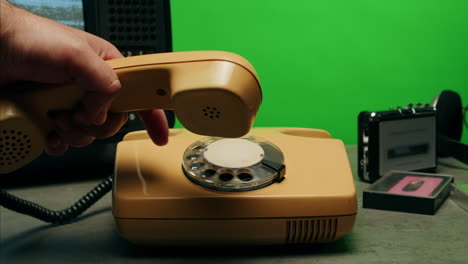 retro vintage phone, a yellow rotary telephone is displayed on a wooden desk, adding a nostalgic touch