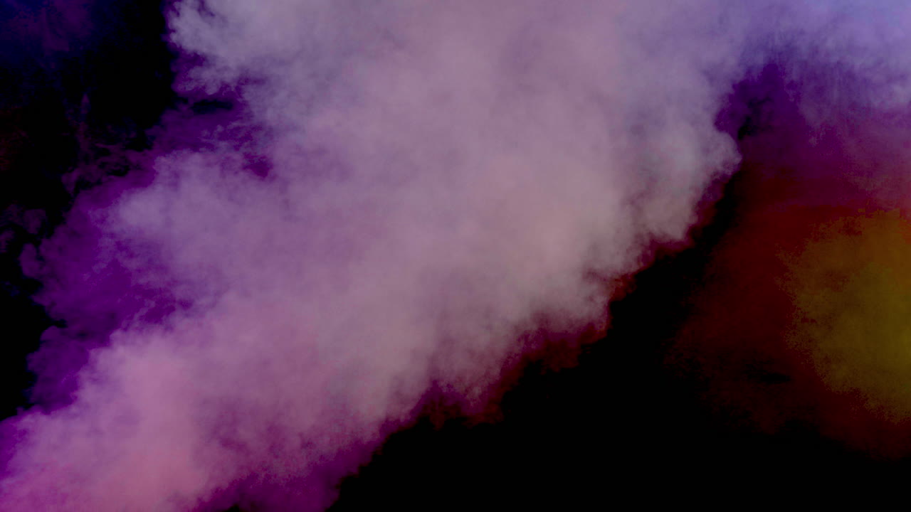 humo colorido sobre un fondo negro