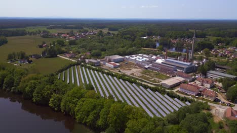 beautiful aerial top view flight solar field plant factory at village chlum, czech republic summer 2023