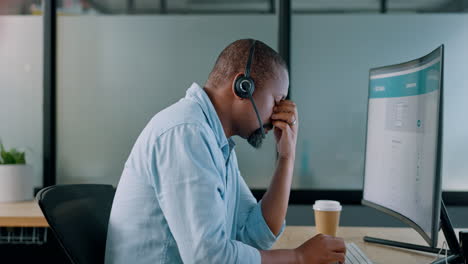 Call-center,-black-man-and-headache-on-computer