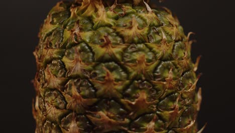 close up of pineapple tilting up